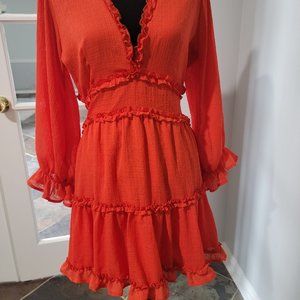 Orange open back flowy dress